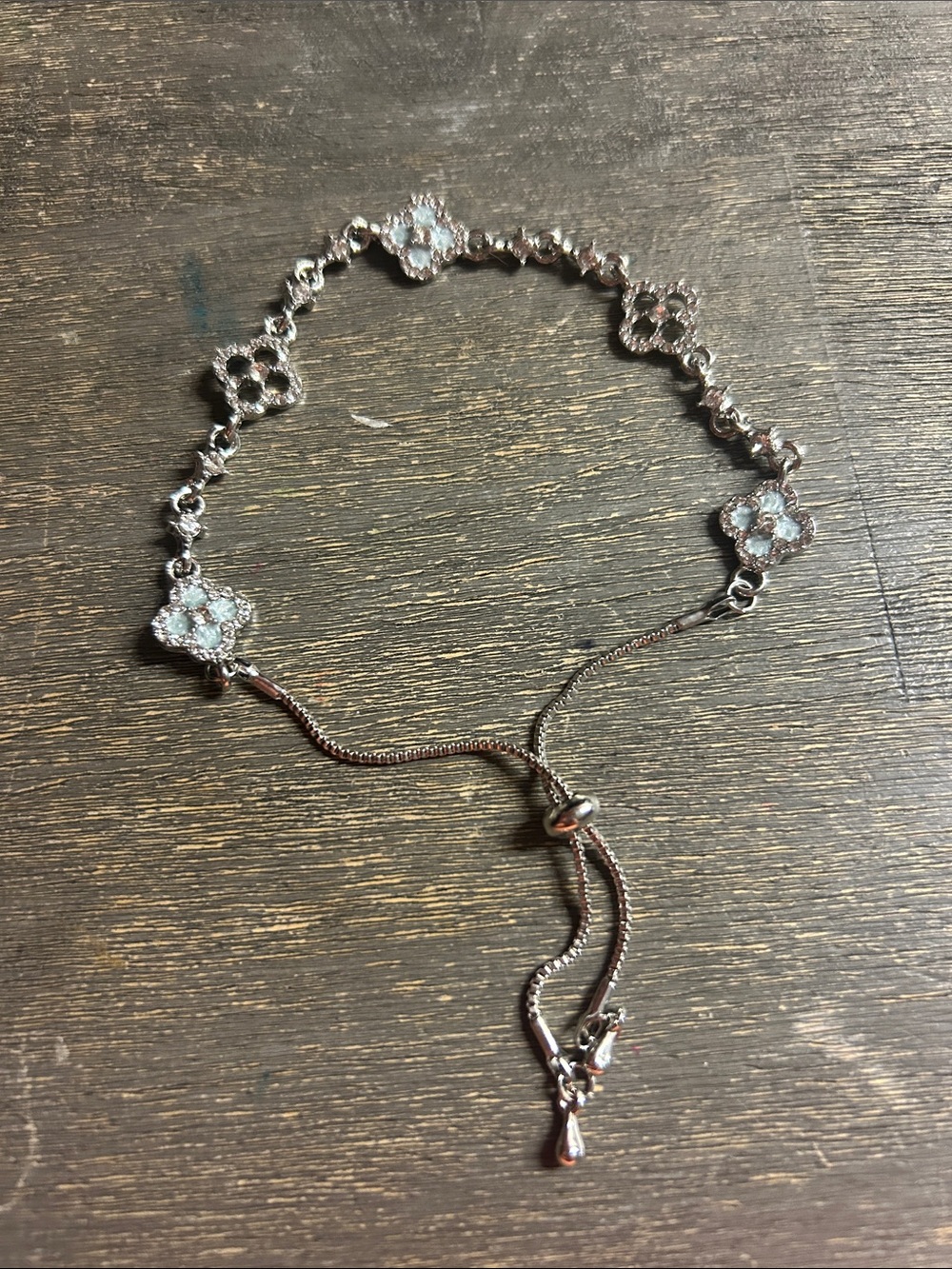 Delicate Silver Floral Sliderβ Bracelet with White Stones